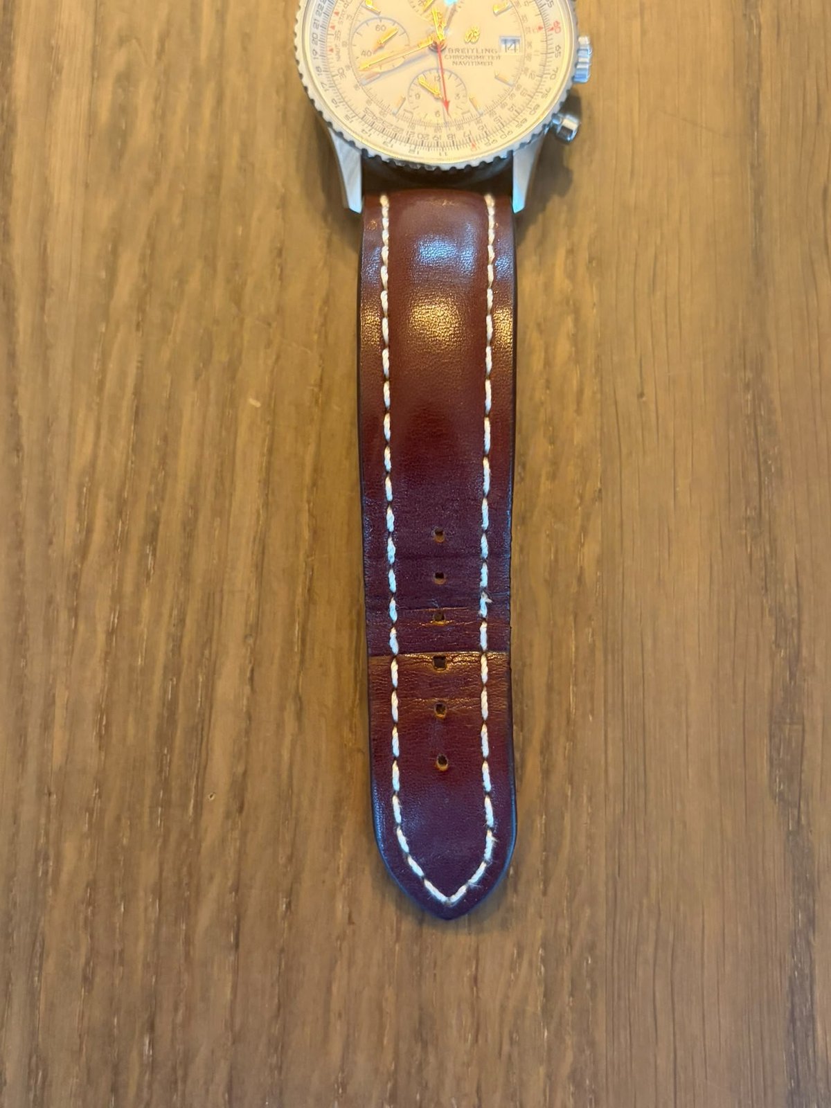 Breitling Navitimer Chronograph 41 — view showing the brown leather strap and lugs from the side